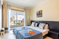 #160 V3 Vila Branca 92 by Home Holidaysにあるベッド