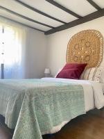 Postel nebo postele na pokoji v ubytování Casa Pirri