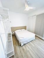 Postel nebo postele na pokoji v ubytování Apartamentos Hotel Puente de Hierro