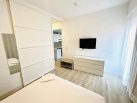 TV a/nebo společenská místnost v ubytování Apartamentos Hotel Puente de Hierro