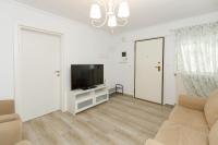 Televízia a/alebo spoločenská miestnosť v ubytovaní Breeze apartment