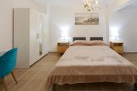 Posteľ alebo postele v izbe v ubytovaní Breeze apartment