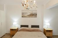 Posteľ alebo postele v izbe v ubytovaní Breeze apartment