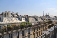 a group of buildings with plants on the roofs at FINESTATE Coliving Champs-Elysées in Paris