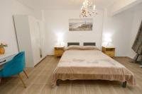 Posteľ alebo postele v izbe v ubytovaní Breeze apartment