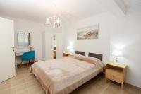 Posteľ alebo postele v izbe v ubytovaní Breeze apartment