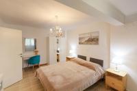 Posteľ alebo postele v izbe v ubytovaní Breeze apartment