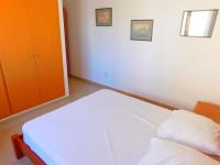 Postel nebo postele na pokoji v ubytování GMID IMMO Apartment Mont Caliu