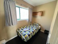Stay Hostel Rotoruaにあるベッド