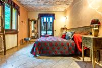 A bed or beds in a room at Cascina Veja