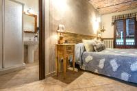 A bed or beds in a room at Cascina Veja