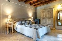 A bed or beds in a room at Cascina Veja