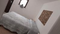 Posteľ alebo postele v izbe v ubytovaní BeaStella Holiday Rooms