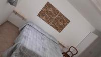 Posteľ alebo postele v izbe v ubytovaní BeaStella Holiday Rooms