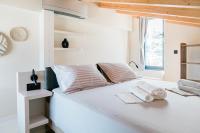 Posteľ alebo postele v izbe v ubytovaní Tempestini Exclusive Villas