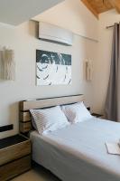 Posteľ alebo postele v izbe v ubytovaní Tempestini Exclusive Villas