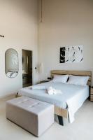 Posteľ alebo postele v izbe v ubytovaní Tempestini Exclusive Villas