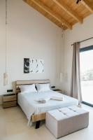 Posteľ alebo postele v izbe v ubytovaní Tempestini Exclusive Villas
