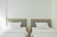 Postel nebo postele na pokoji v ubytování S1 Trang Hotel