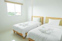 Postel nebo postele na pokoji v ubytování S1 Trang Hotel