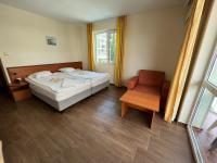 Postel nebo postele na pokoji v ubytování Family Hotel Romantik