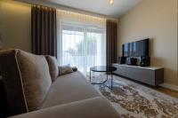 Telewizja i/lub zestaw kina domowego w obiekcie Apartament Luxury Two-bedroom