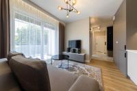 Telewizja i/lub zestaw kina domowego w obiekcie Apartament Luxury Two-bedroom
