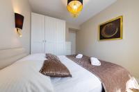Łóżko lub łóżka w pokoju w obiekcie Apartament Luxury Two-bedroom