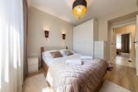Łóżko lub łóżka w pokoju w obiekcie Apartament Luxury Two-bedroom