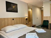 Posteľ alebo postele v izbe v ubytovaní Hotel Gromada Łomża