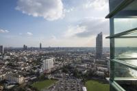 a view of a city from a building at Chatrium Hotel Riverside Bangkok in Bangkok