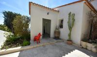 a red horse statue in front of a house at Séjour de Luxe à Golfe Juan, 15 mn de Cannes in Vallauris