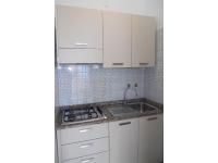 A kitchen or kitchenette at Two-room flat close to the beach and nature