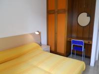 A bed or beds in a room at Two-room flat close to the beach and nature