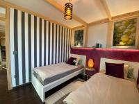 Posteľ alebo postele v izbe v ubytovaní La Casa del Vino, Lichtdurchflutete Villa mit Pool, atemberaubender Meerblick