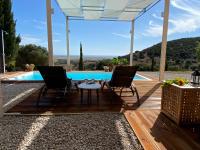 Bazén v ubytovaní La Casa del Vino, Lichtdurchflutete Villa mit Pool, atemberaubender Meerblick alebo v jeho blízkosti