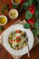 a bowl of food with a fork on a table at Hotel Thrive, A Tropical Courtyard in Kathmandu
