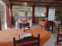 Khu vực ghế ngồi tại Ajubá Pousada