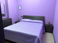 A bed or beds in a room at Apartment Sabine