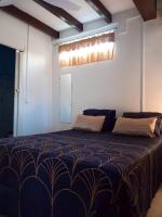 a bedroom with a large bed in a room at Appartement d&#39;une chambre avec balcon et wifi a Le Vauclin a 3 km de la plage in Le Vauclin