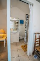 Kuchnia lub aneks kuchenny w obiekcie Maison de village cosy avec terrasse privée