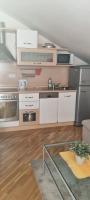Kuchyň nebo kuchyňský kout v ubytování Apartment Jana