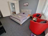 Postel nebo postele na pokoji v ubytování Apartmán U Petra