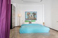 Serenity Boutique Suitesにあるベッド