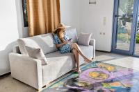 Serenity Boutique Suitesにあるシーティングエリア