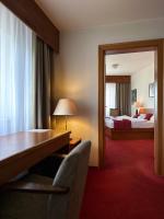 Postel nebo postele na pokoji v ubytování Hotel Theresia