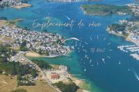 an aerial view of a harbor with boats in the water at 30 m des Plages - Port du Magouër - 6 invités in Plouhinec