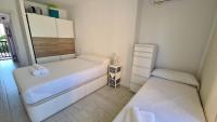 Posteľ alebo postele v izbe v ubytovaní Apartamento Acacias IV 5 IF Benidorm