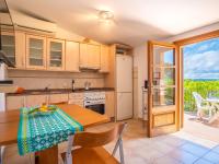 Kuchyňa alebo kuchynka v ubytovaní Holiday Home Can Pere Mas by Interhome