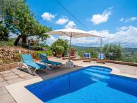 Bazén v ubytovaní Holiday Home Can Pere Mas by Interhome alebo v jeho blízkosti